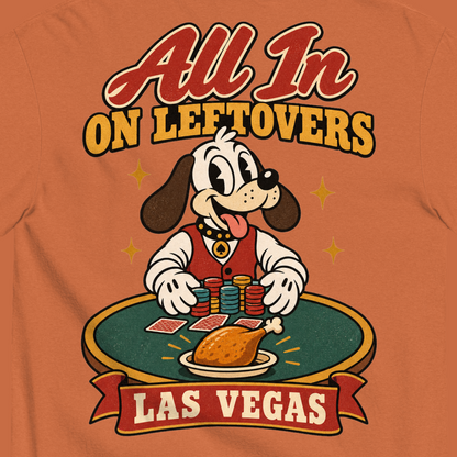 All In on Leftovers T-Shirt in Yam, close-up of the back print, Lucky the dog in a dealer vest pushes poker chips toward a roast turkey on green felt