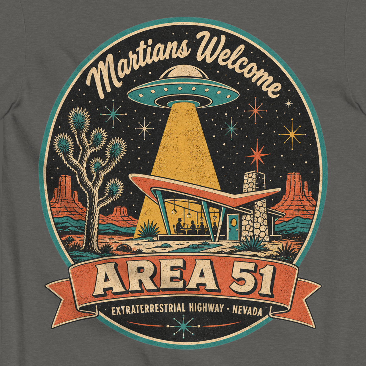 Area 51 Badge T-Shirt in Pepper, close-up of the back print, flying saucer beaming down on a retro desert diner