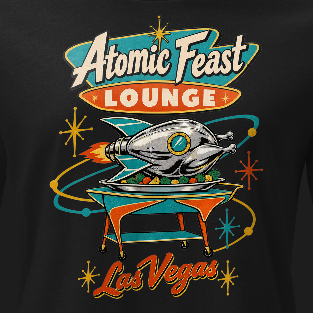 Atomic Feast Lounge Relaxed T-Shirt in Black, close-up of the front print, a chrome rocket-shaped roast turkey on a mid-century serving cart under a Googie sign