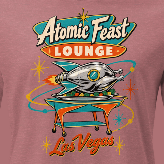 Atomic Feast Lounge Relaxed T-Shirt in Heather Mauve, close-up of the front print, a chrome rocket-shaped roast turkey on a mid-century serving cart under a Googie sign