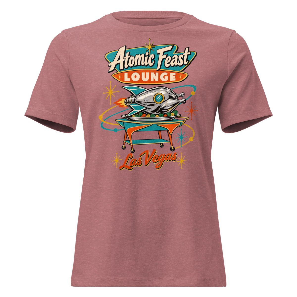 Atomic Feast Lounge Relaxed T-Shirt in Heather Mauve, front view, a chrome rocket-shaped roast turkey on a mid-century serving cart under a Googie sign