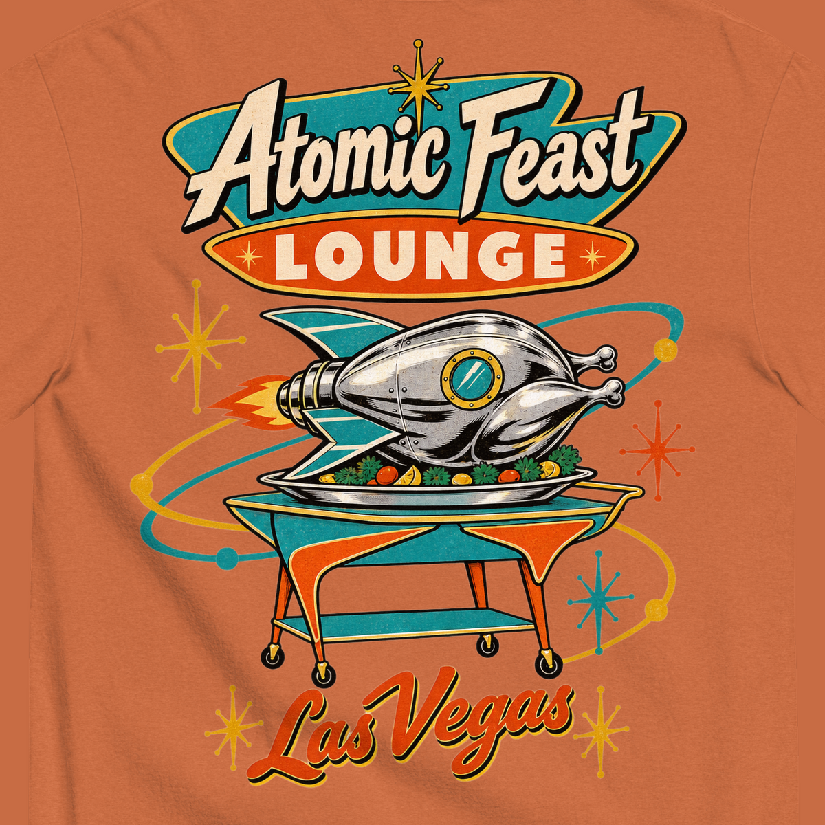 Atomic Feast Lounge T-Shirt in Yam, close-up of the back print, a chrome rocket-shaped roast turkey on a mid-century serving cart under a Googie sign