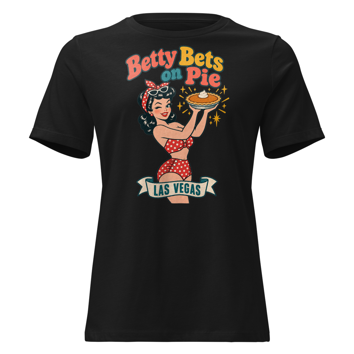 Betty Bets on Pie Relaxed T-Shirt in Black, front view, Downtown Betty in a polka dot swimsuit holds up a pumpkin pie like a jackpot and winks