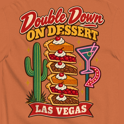 Double Down on Dessert T-Shirt in Yam, close-up of the back print, pumpkin, cherry and pecan pie slices stacked like casino chips by a cactus and neon