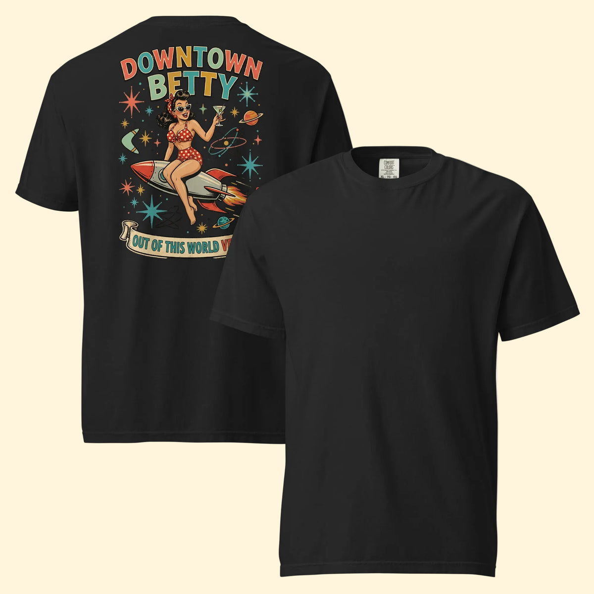 Downtown Betty Out Of This World T-Shirt in Black, front and back views, Downtown Betty pinup riding a retro rocket graphic