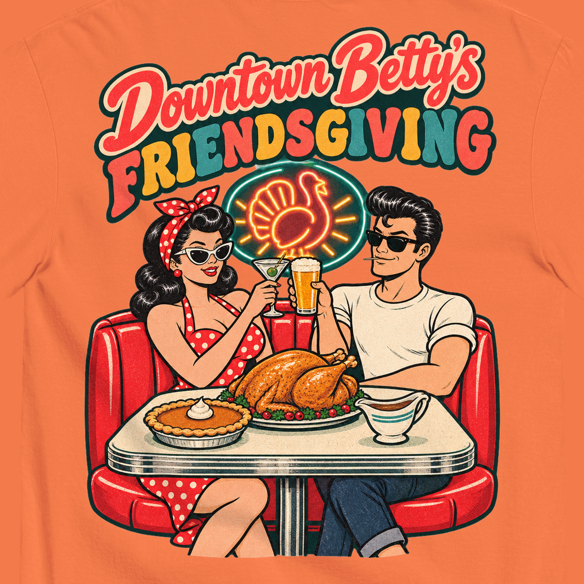Downtown Betty's Friendsgiving T-Shirt in Burnt Orange, close-up of the back print, Downtown Betty and Fremont Frank toast over a turkey dinner in a retro diner booth