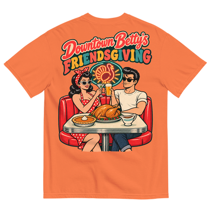 Downtown Betty's Friendsgiving T-Shirt in Burnt Orange, back print, Downtown Betty and Fremont Frank toast over a turkey dinner in a retro diner booth
