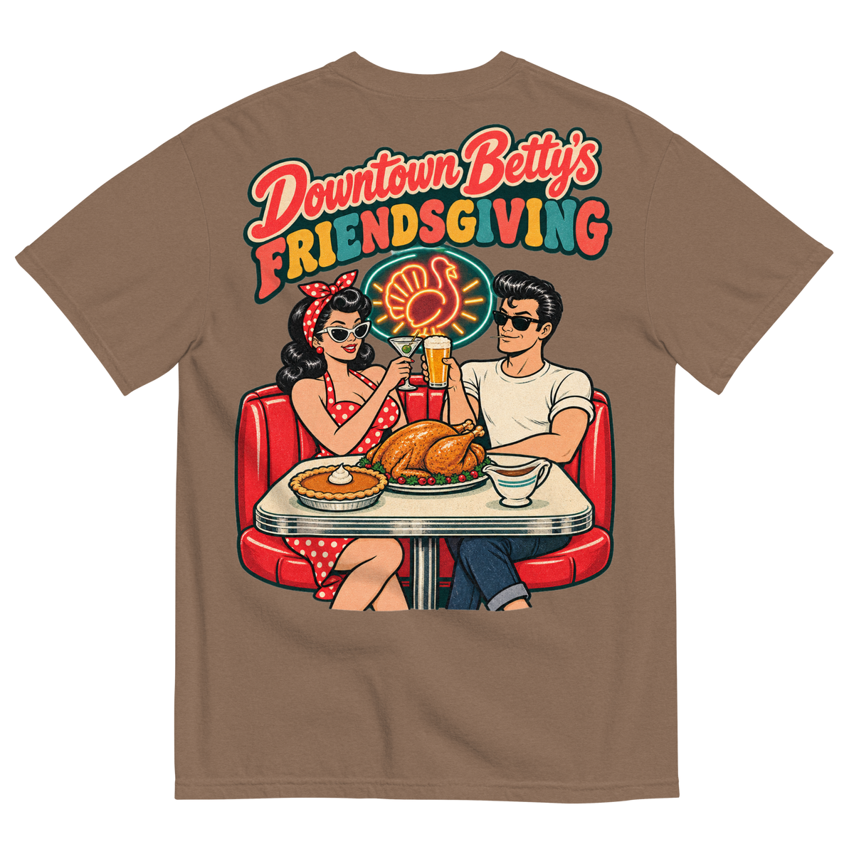 Downtown Betty's Friendsgiving T-Shirt in Espresso, back print, Downtown Betty and Fremont Frank toast over a turkey dinner in a retro diner booth