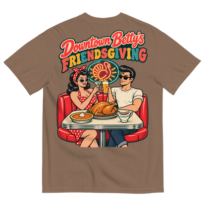 Downtown Betty's Friendsgiving T-Shirt in Espresso, back print, Downtown Betty and Fremont Frank toast over a turkey dinner in a retro diner booth