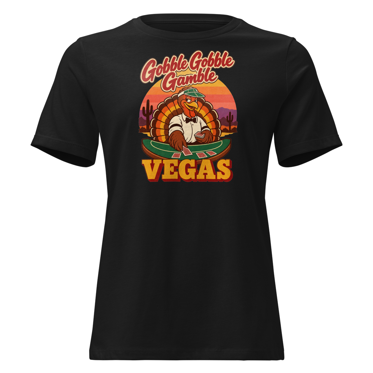 Gobble Gobble Gamble Relaxed T-Shirt in Black, front view, a turkey in a green dealer visor deals blackjack at a felt table under a desert sunset