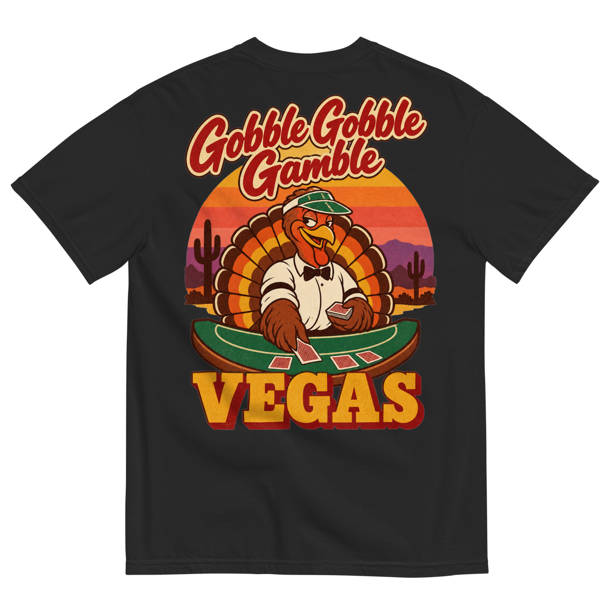 Gobble Gobble Gamble T-Shirt in Black, back print, a turkey in a green dealer visor deals blackjack at a felt table under a desert sunset