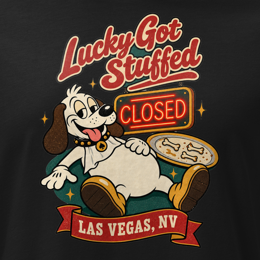 Lucky Got Stuffed Relaxed T-Shirt in Black, close-up of the front print, Lucky the dog on his back with a full belly by an empty turkey platter and CLOSED neon
