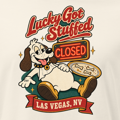 Lucky Got Stuffed Relaxed T-Shirt in Natural, close-up of the front print, Lucky the dog on his back with a full belly by an empty turkey platter and CLOSED neon