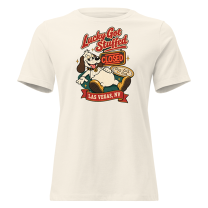 Lucky Got Stuffed Relaxed T-Shirt in Natural, front view, Lucky the dog on his back with a full belly by an empty turkey platter and CLOSED neon