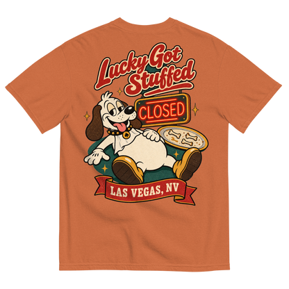 Lucky Got Stuffed T-Shirt in Yam, back print, Lucky the dog on his back with a full belly by an empty turkey platter and CLOSED neon