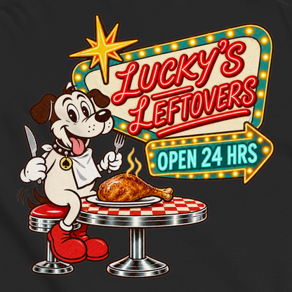 Lucky's Leftovers T-Shirt in Black, close-up of the back print, Lucky the cartoon dog in a bib with knife and fork eyeing a turkey leg at a retro diner
