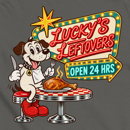 Lucky's Leftovers T-Shirt in Pepper, close-up of the back print, Lucky the cartoon dog in a bib with knife and fork eyeing a turkey leg at a retro diner