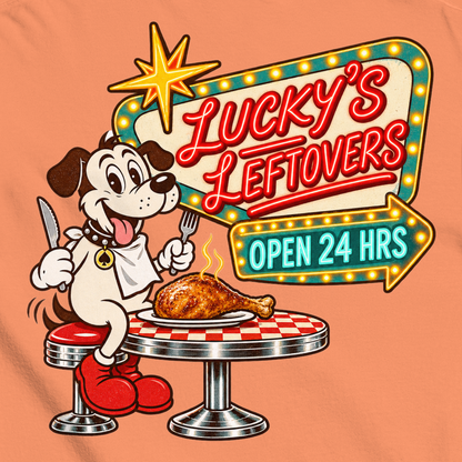 Lucky's Leftovers T-Shirt in Terracotta, close-up of the back print, Lucky the cartoon dog in a bib with knife and fork eyeing a turkey leg at a retro diner