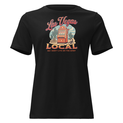 No I Don't Live On The Strip Relaxed T-Shirt in Black, front view, retro slot machine on triple 7s among saguaros with a rattlesnake and scorpion