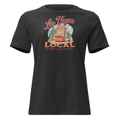 No I Don't Live On The Strip Relaxed T-Shirt in Dark Grey Heather, front view, retro slot machine on triple 7s among saguaros with a rattlesnake and scorpion