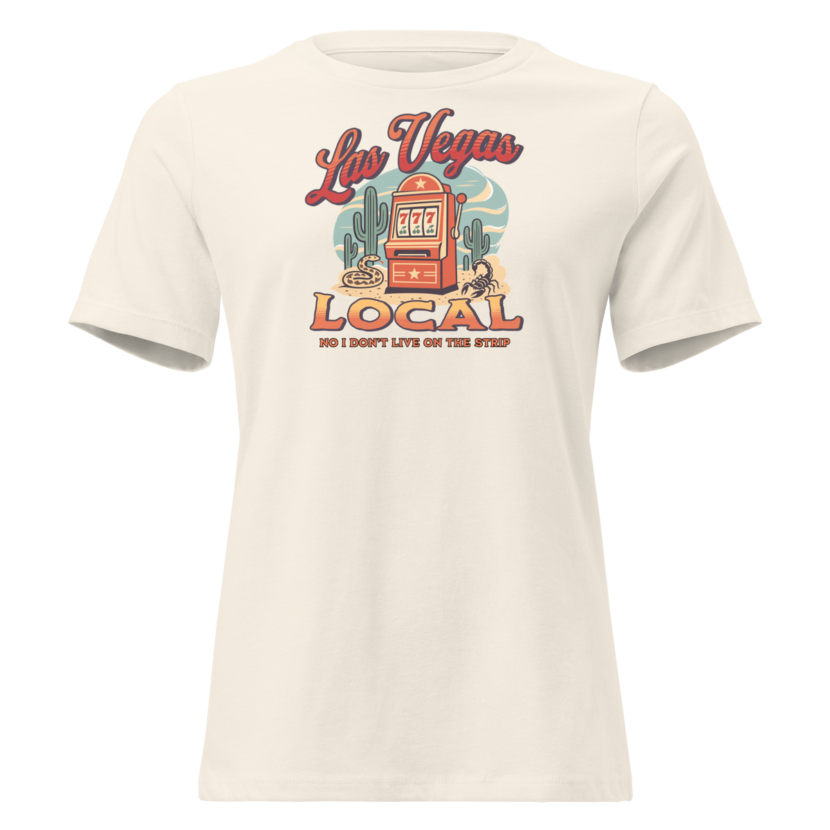 No I Don't Live On The Strip Relaxed T-Shirt in Natural, front view, retro slot machine on triple 7s among saguaros with a rattlesnake and scorpion