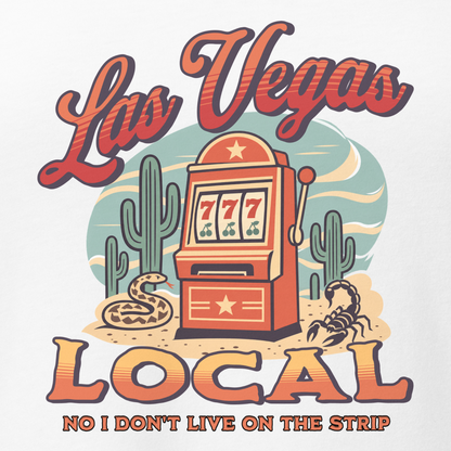 No I Don't Live On The Strip V-Neck in Solid White Blend, close-up of the front print, retro slot machine on triple 7s among saguaros with a rattlesnake and scorpion