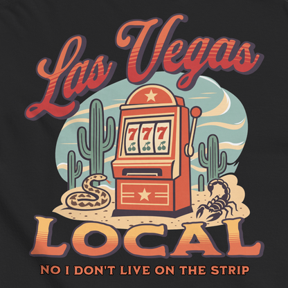 No I Don't Live On The Strip T-Shirt in Black, close-up of the back print, retro slot machine on triple 7s among saguaros with a rattlesnake and scorpion