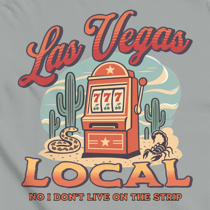 No I Don't Live On The Strip T-Shirt in Granite, close-up of the back print, retro slot machine on triple 7s among saguaros with a rattlesnake and scorpion