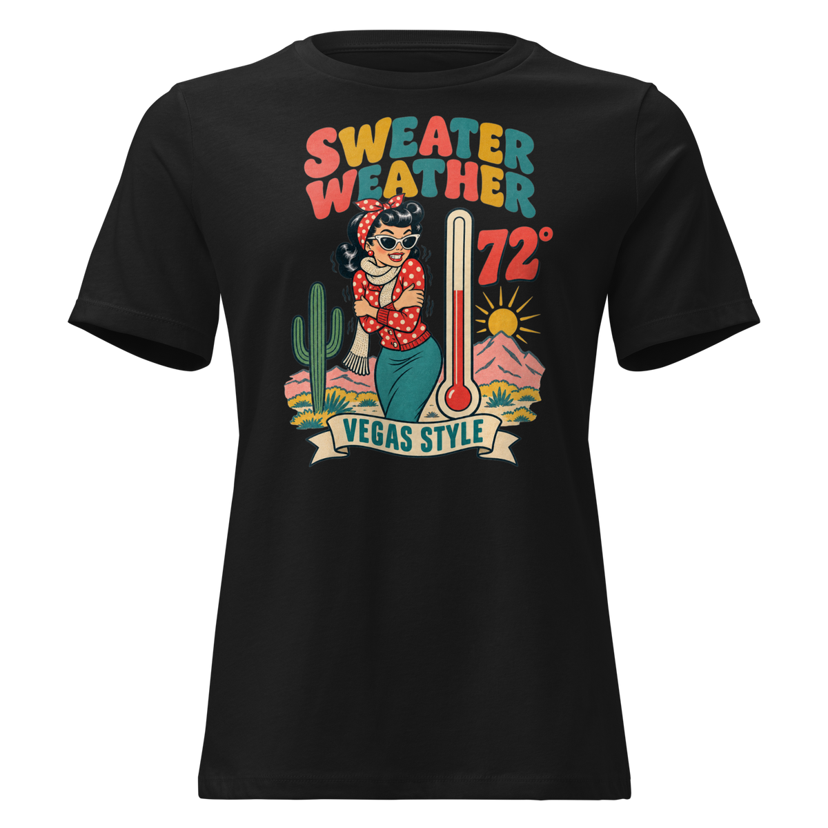 Sweater Weather Relaxed T-Shirt in Black, front view, Downtown Betty shivering in a scarf beside a thermometer reading 72 degrees and a cactus