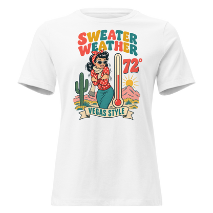 Sweater Weather Relaxed T-Shirt in White, front view, Downtown Betty shivering in a scarf beside a thermometer reading 72 degrees and a cactus