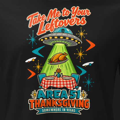Take Me to Your Leftovers Relaxed T-Shirt in Black, close-up of the front print, a flying saucer beams a roast turkey off a checkered 1950s table among atomic starbursts