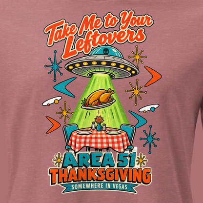 Take Me to Your Leftovers Relaxed T-Shirt in Heather Mauve, close-up of the front print, a flying saucer beams a roast turkey off a checkered 1950s table among atomic starbursts