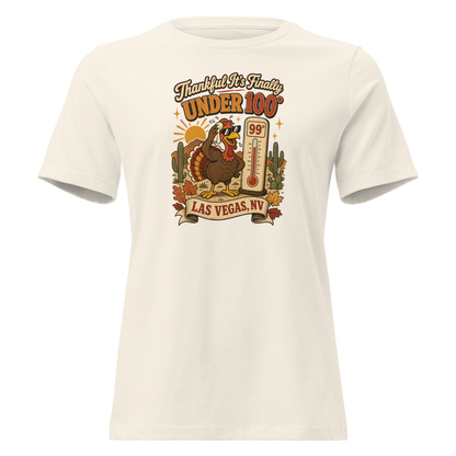 Thankful It's Finally Under 100 Relaxed T-Shirt in Natural, front view, Turkey in sunglasses by a 99 degree thermometer, cactus and fall leaves
