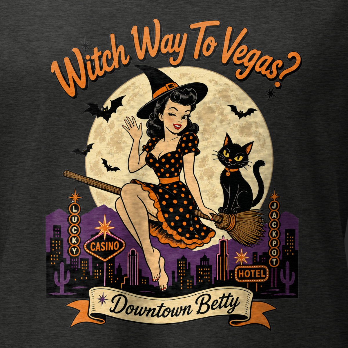Witch Way To Vegas V-Neck in Dark Grey Heather, close-up of the front print, Downtown Betty pinup witch on a broom over a neon Vegas skyline