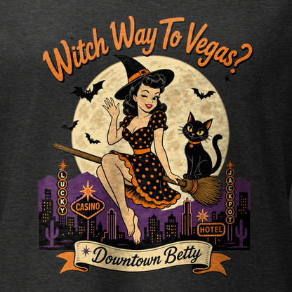 Witch Way To Vegas V-Neck in Dark Grey Heather, close-up of the front print, Downtown Betty pinup witch on a broom over a neon Vegas skyline