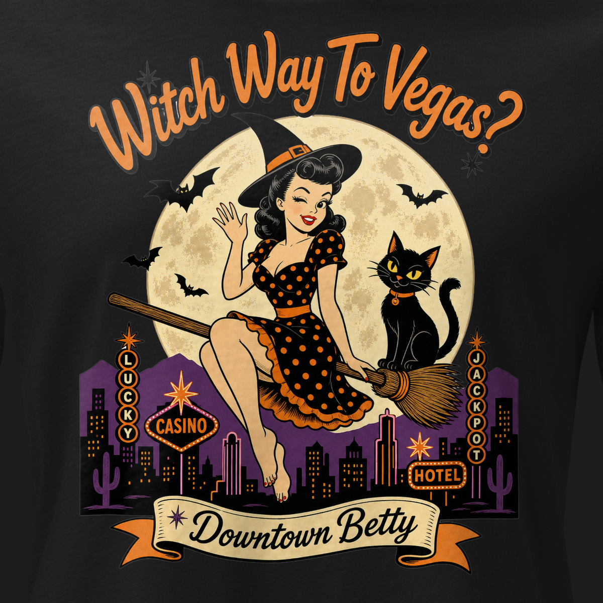 Witch Way To Vegas Relaxed T-Shirt in Black, close-up of the front print, Downtown Betty pinup witch on a broom over neon Vegas