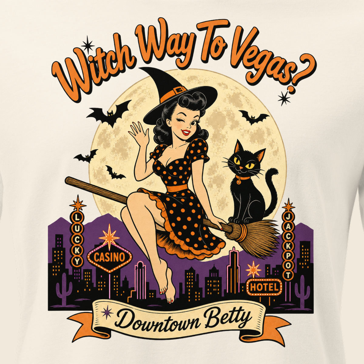 Witch Way To Vegas Relaxed T-Shirt in Natural, close-up of the front print, Downtown Betty pinup witch on a broom over neon Vegas