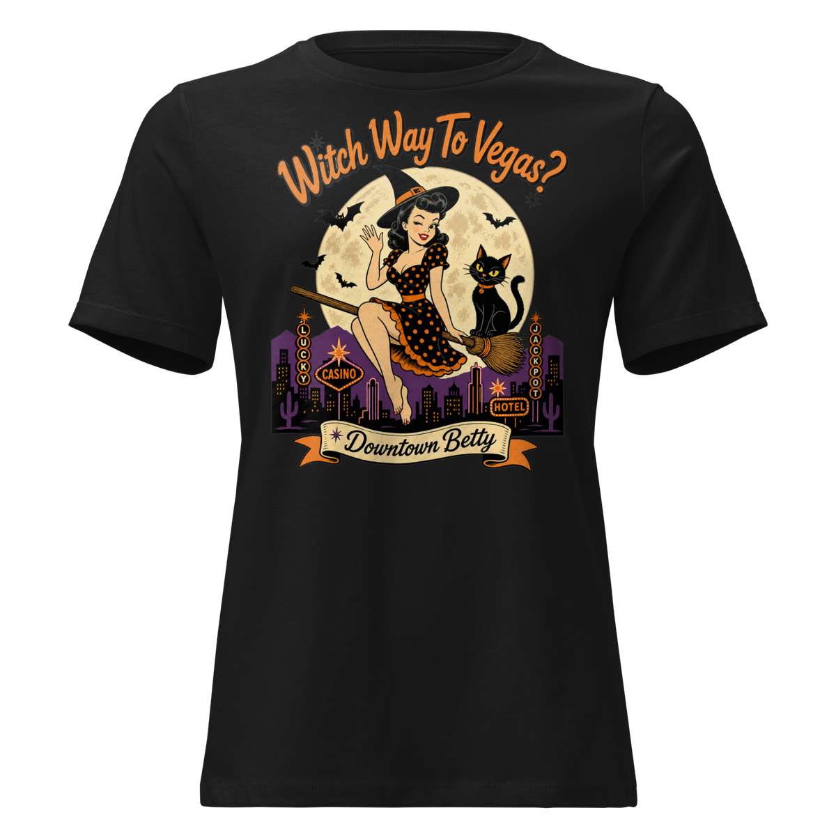 Witch Way To Vegas Relaxed T-Shirt in Black, front view, retro pinup witch and black cat Halloween graphic