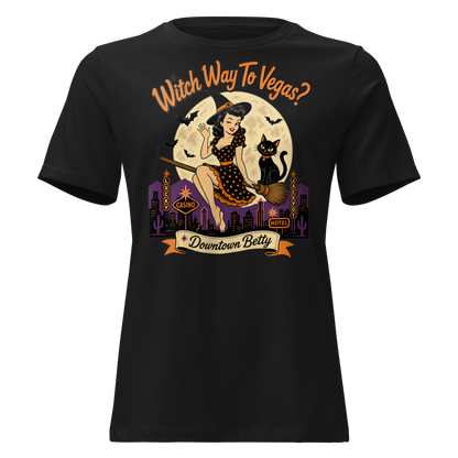 Witch Way To Vegas Relaxed T-Shirt in Black, front view, retro pinup witch and black cat Halloween graphic