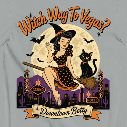 Witch Way To Vegas T-Shirt in Granite, close-up of the back print, Downtown Betty pinup witch on a broom over a neon Vegas skyline