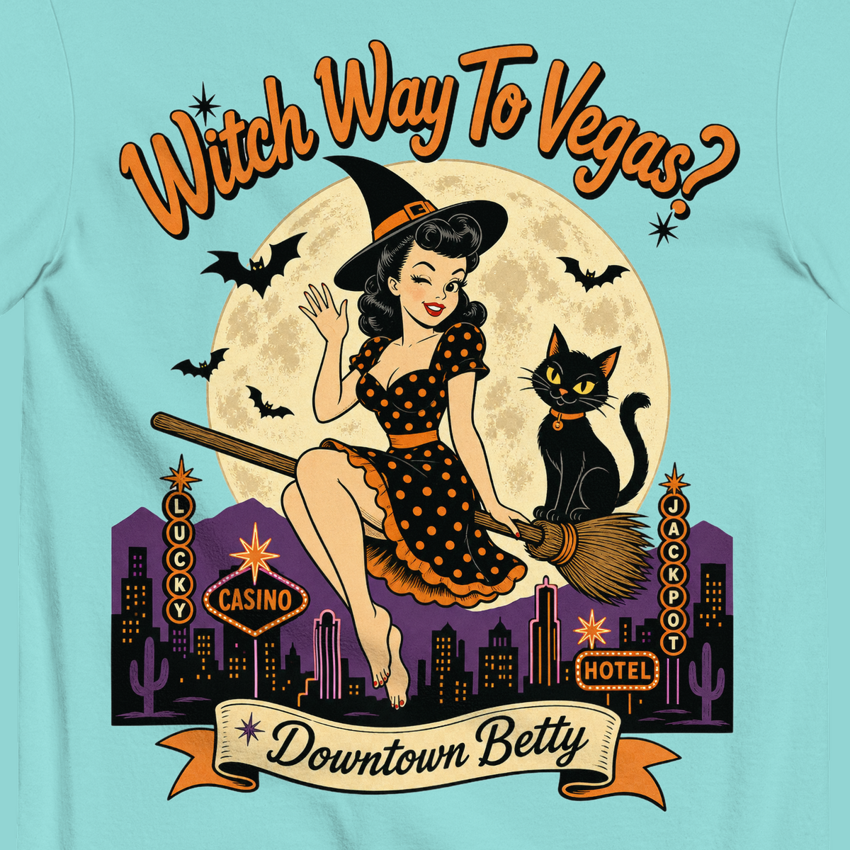 Witch Way To Vegas T-Shirt in Lagoon Blue, close-up of the back print, Downtown Betty pinup witch on a broom over a neon Vegas skyline